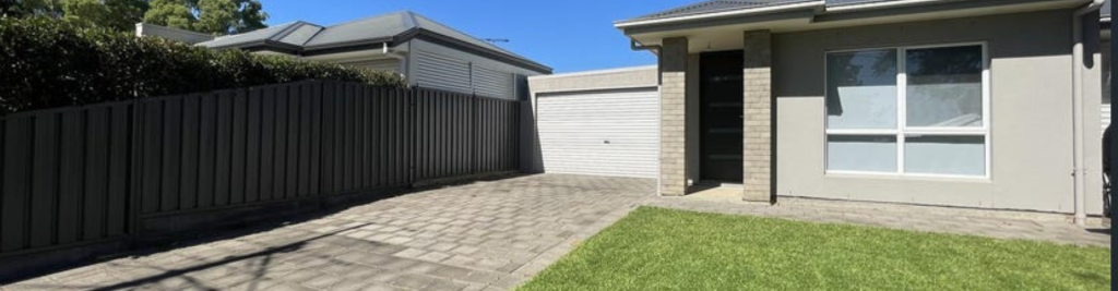 Access4u Travers Street home facade, dark grey roof with grey bricks