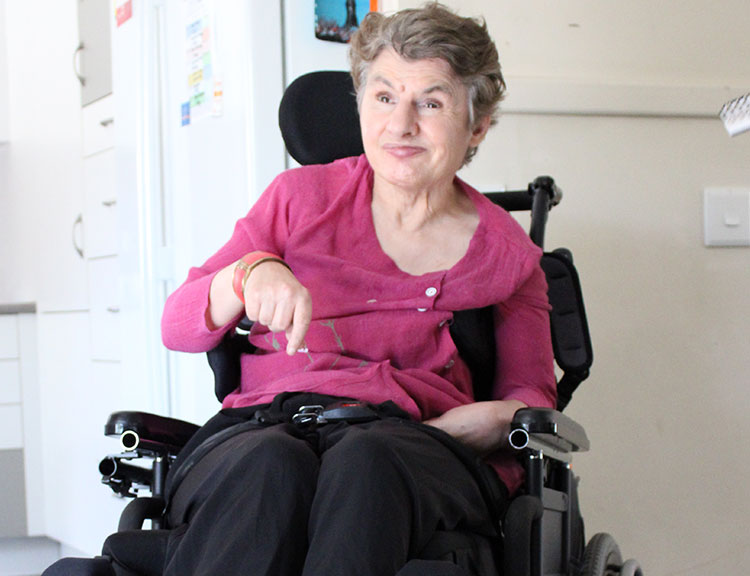 Access4u customer in a wheelchair, smiling at the camera
